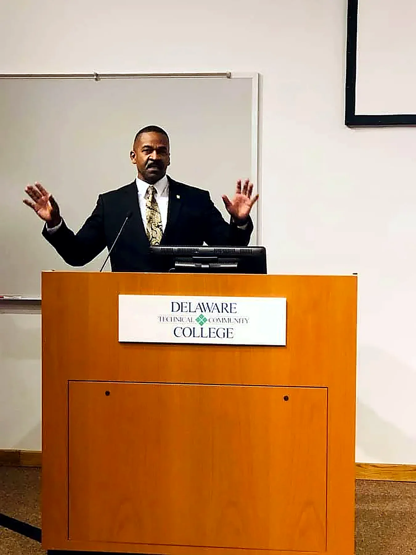 Rev. Moore speaking at Delaware Technical Community College